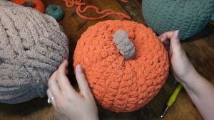 Graceful Crochet Pumpkin Pillow For Rustic Elegance